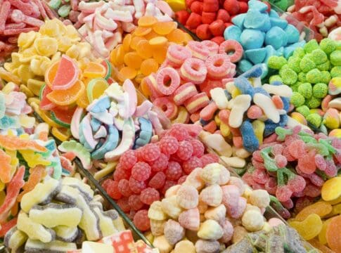 How much candy do Americans eat in a whole year?