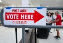 What the law says about armed officers at polling places